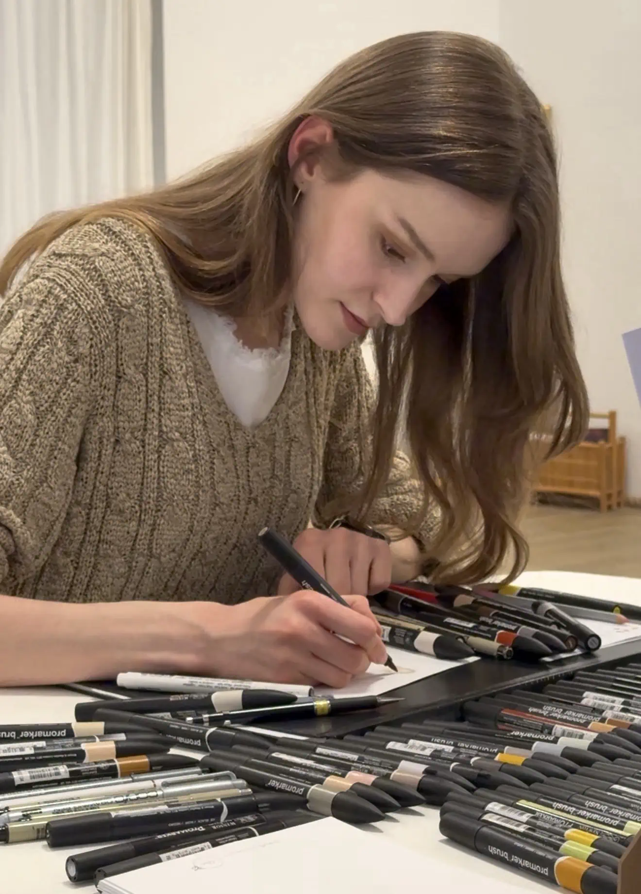Eva Kovacik performing live illustration at an event